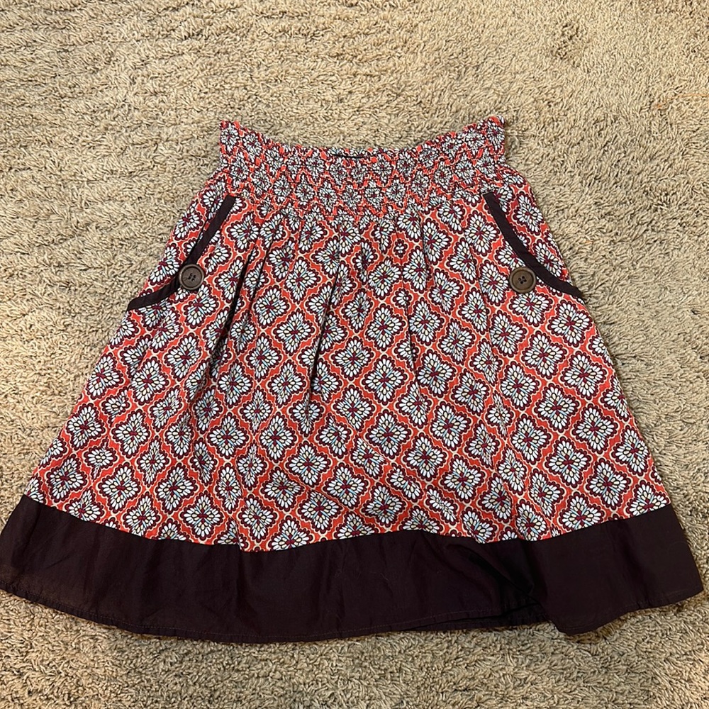 Three Pink Hearts Trixxi pattern skirt with wooden buttons